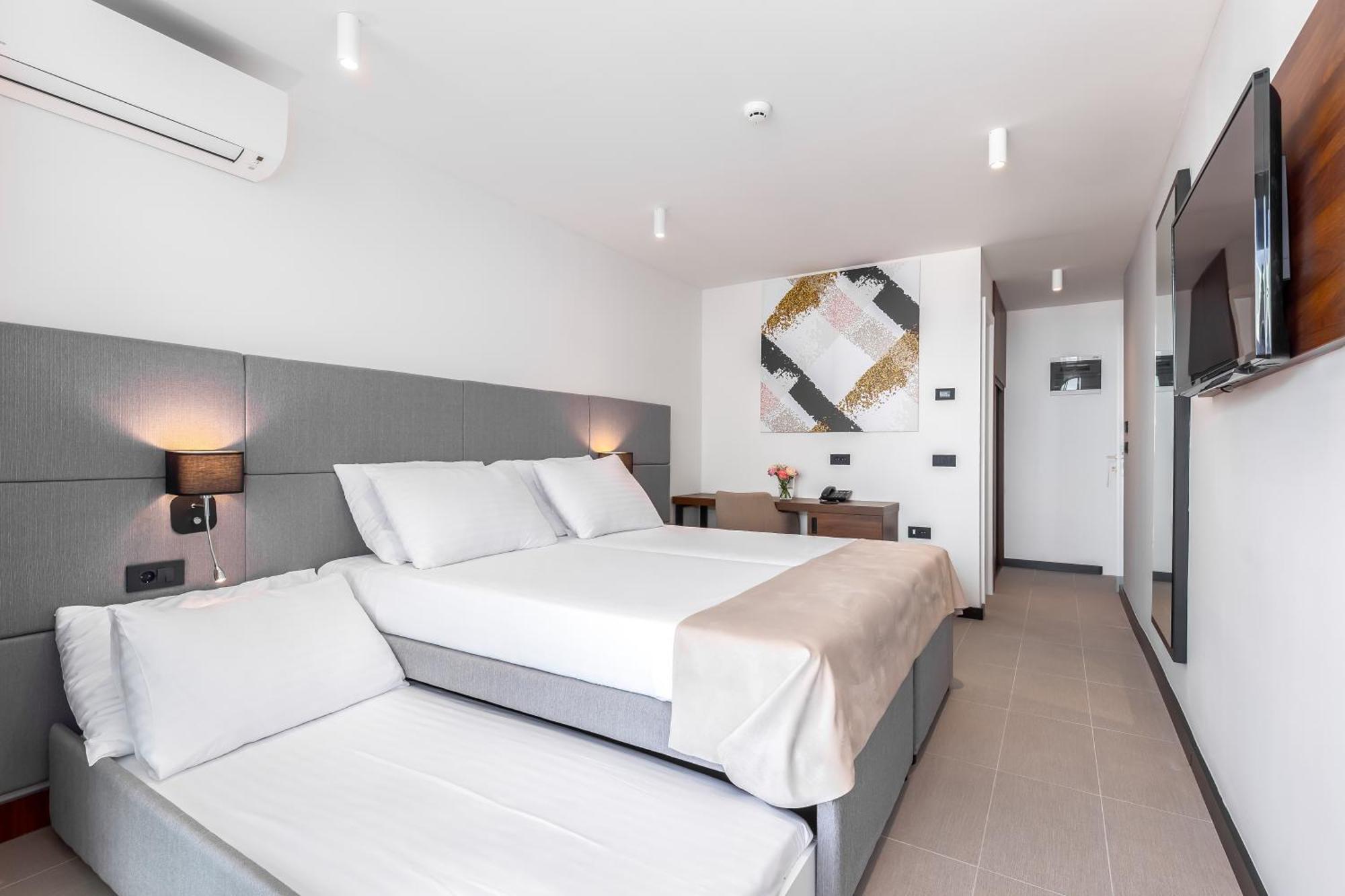 Double Room with Extra pull-out Bed, Sea Side View and Balcony
