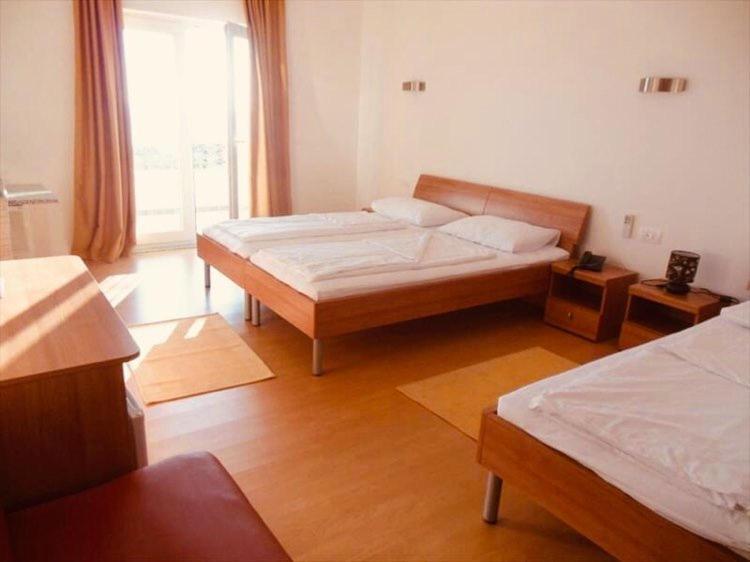 Dreibettzimmer mit Meerblick
