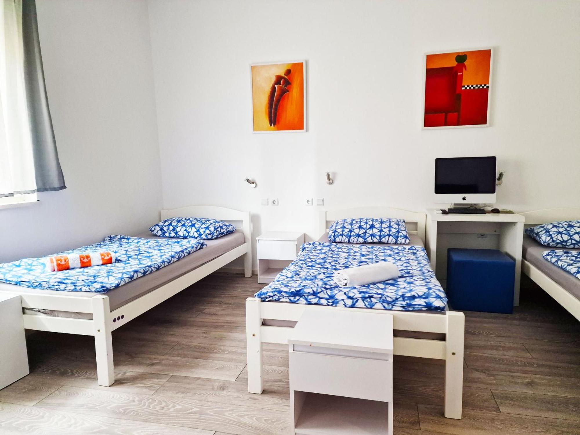 Chambre Triple avec Salle de Bains Commune