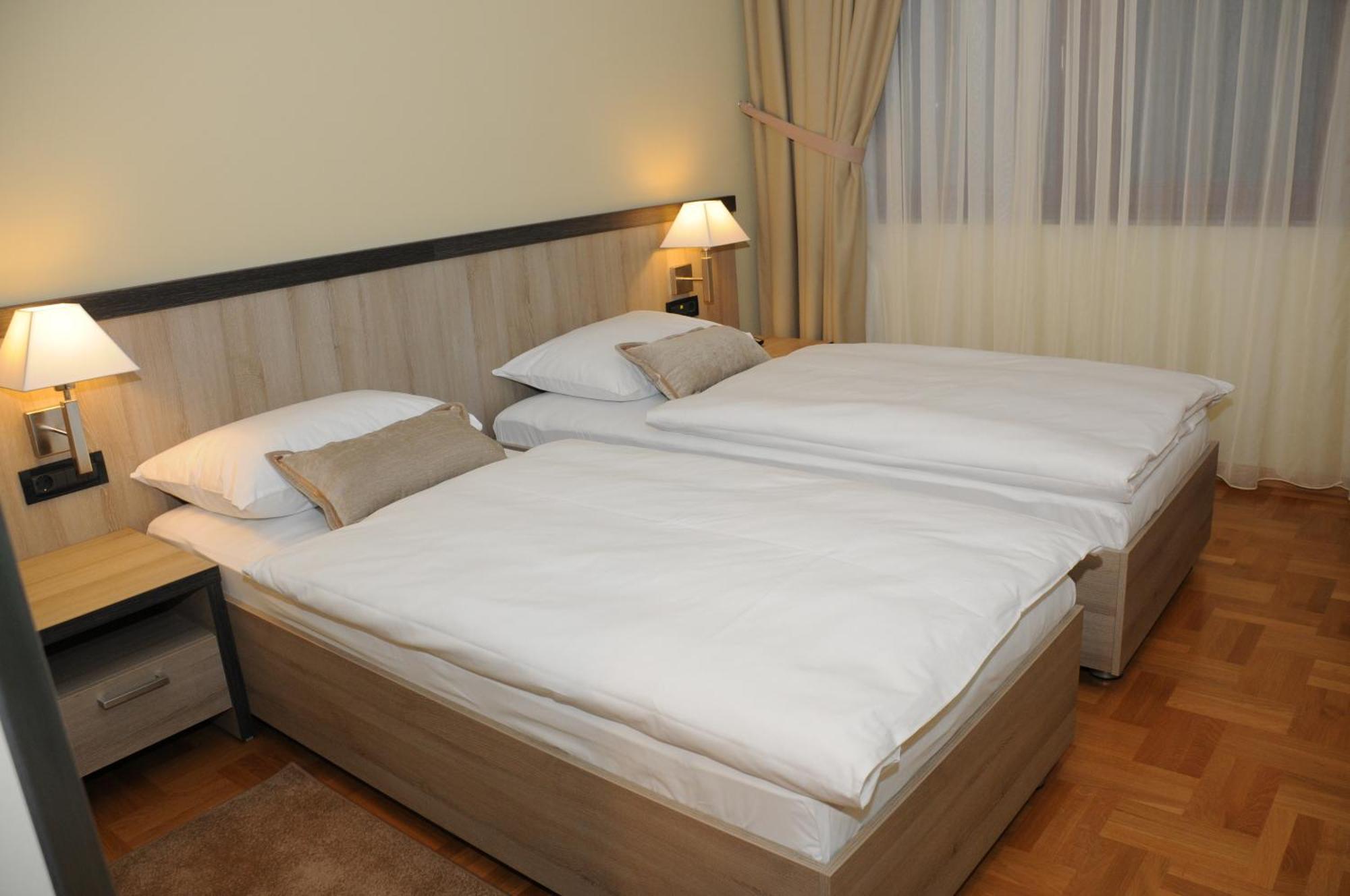 Tweepersoonskamer met 1 of 2 Bedden