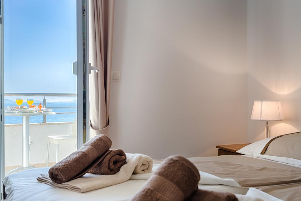 Tweepersoonskamer met Balkon en Uitzicht op Zee